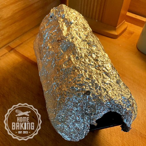 Foiled Covered Bran Loaf Ready for Baking